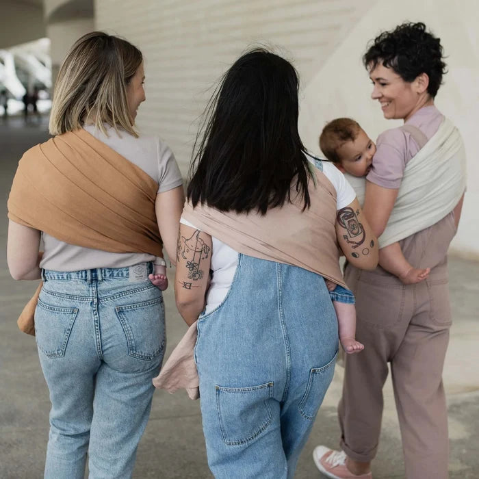 A Boba Ring Sling Baby Carrier made from a unique linen bamboo viscose fabric blend, perfect for all seasons. Lightweight and breathable, it stores compactly, ideal for newborn snuggles to toddler ups and downs (8 - 35Ibs). Peony Pink