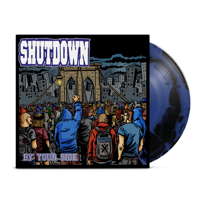 A black and blue vinyl peeks out of a black jacket with an image of a mob of people at the entrance of a castle moat with the words "Shutdown: Always Here By Your Side" on it.