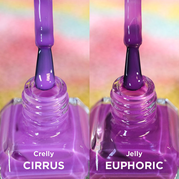 Two open bottles of nail polish with brushes showing. Comparing purples of Cirrus and Euphoric Nail Lacquers.
