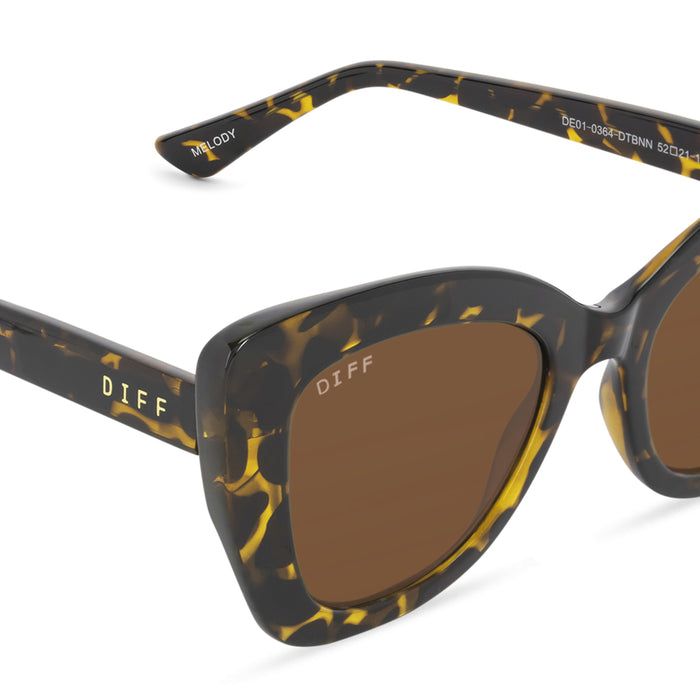 diff eyewear melody cat eye sunglasses with a dark tortoise frame and brown lenses detailed view