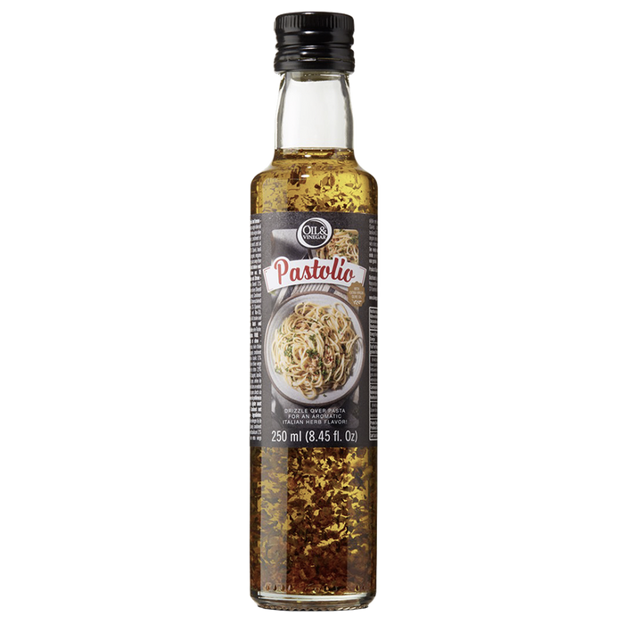 A bottle of Pastolio flavored olive oil with visible suspended particles, indicating a seasoned oil.