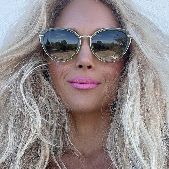 customer content - obsessedandyouneedit wearing star wars x diff eyewear princess leia™ endor™ cat eye sunglasses with a transulucent sage green acetate and gold metal frame with endor forest moon green polarized lenses front view