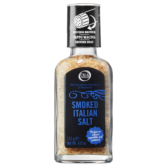 A glass bottle of smoked Italian salt with a grinder cap, labeled and including product information.