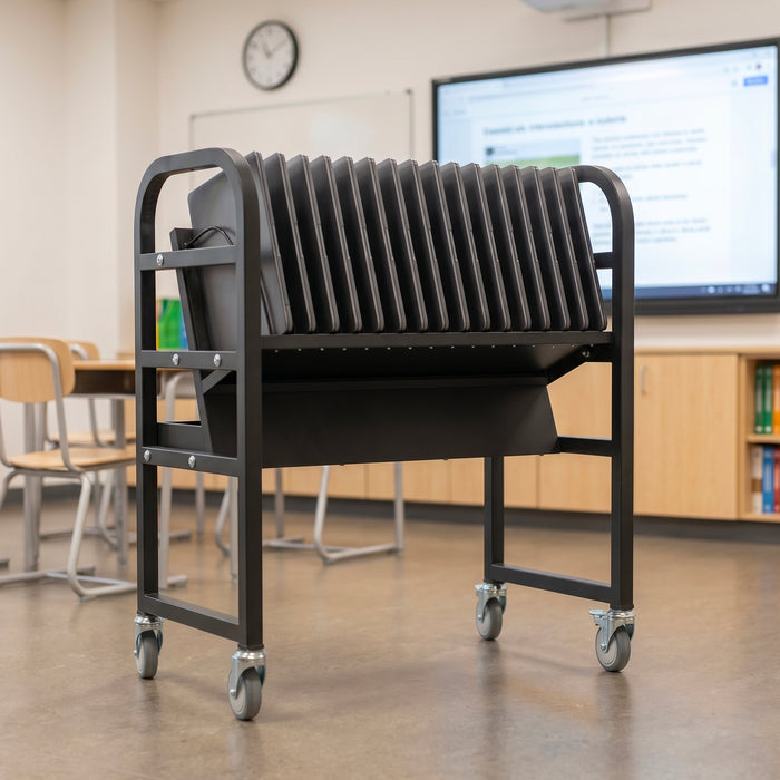 Black rolling cart in a classroom setting with desks and a TV in the background