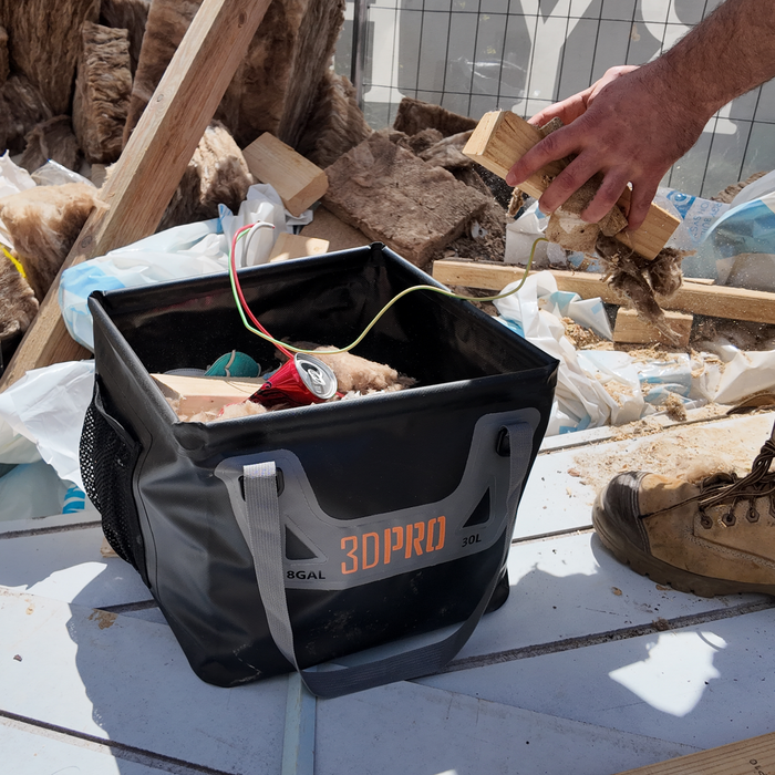 30L/8GAL Pro Square Folding Bucket with '3DPRO' branding on a construction site.
