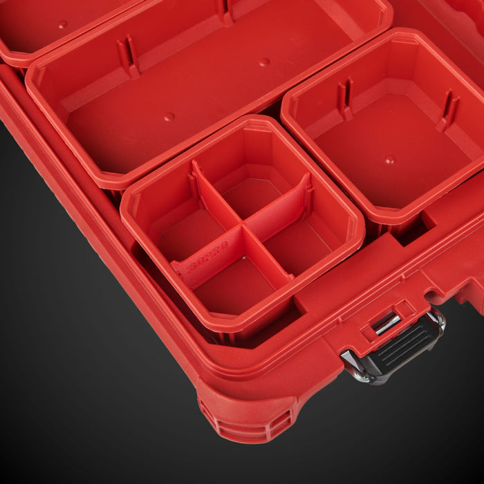 Red Milwaukee tool box with 4-Way Low Single Bin Divider (MP) on a dark background