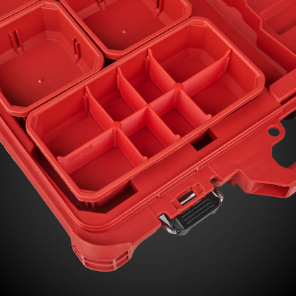 Red tool box with red 8-Way Low Double Bin Divider (MP)  on a black background