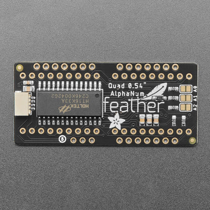 Adafruit 14-Segment Alphanumeric LED FeatherWing by Adafruit - The Pi Hut