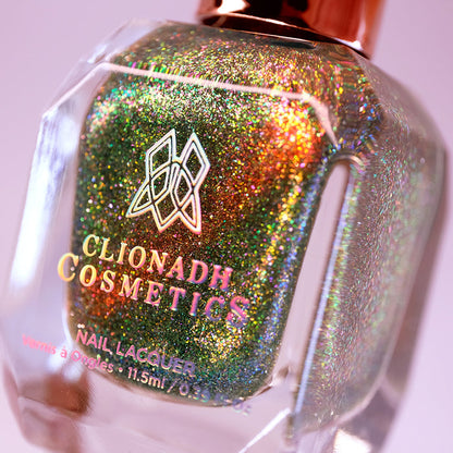 Angled, close-up of Apple Picking Nail Lacquer bottle on a white background.