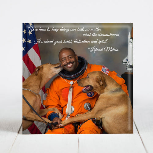 Astronaut Leland Melvin with his rescue dogs Jake and Scout