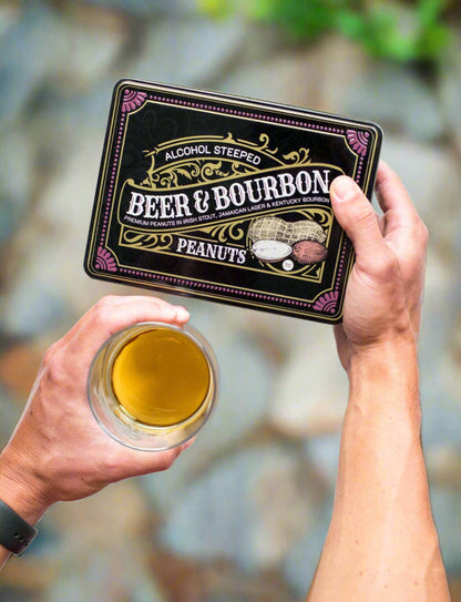 Man holding Beer and Bourbon Liquor Peanuts tin and a glass of beer