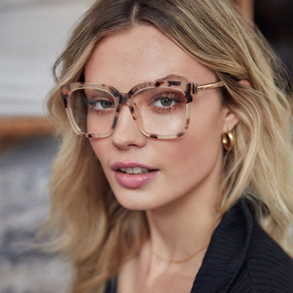 on model - female wearing diff eyewear bella square glasses with a cream tortoise frame and clear prescription lenses close up