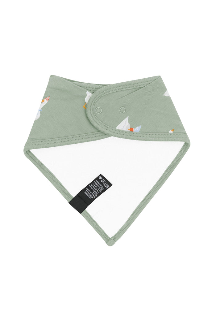 The back of the Bib in Silly Goose showing the snap closures and bamboo terry backing