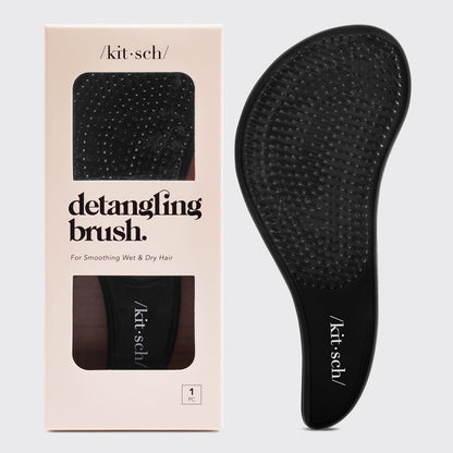 Black Kitsch Detangling Brush on a neutral background