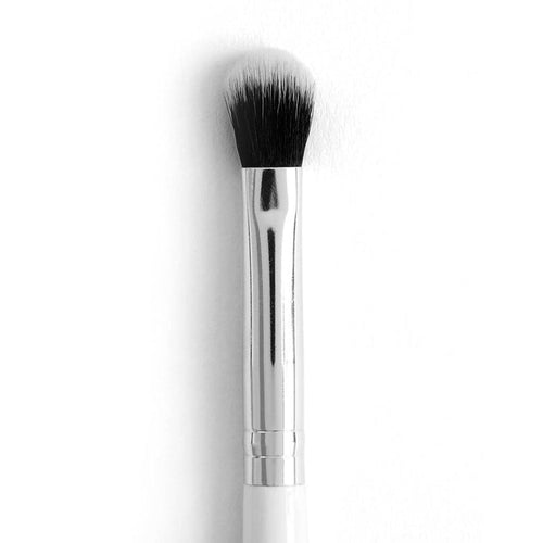 ColourPop Blending Brush makeup brush blending and diffusing eyeshadow; soft domed duo-fiber black-to-white synthetic bristles with a polished chrome ferrule and white handle, shown close-up on a white background.