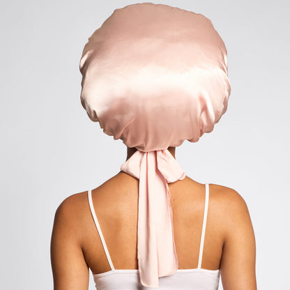 KITSCH Blush Oversized Satin Bonnet — model close-up — double-layered satin