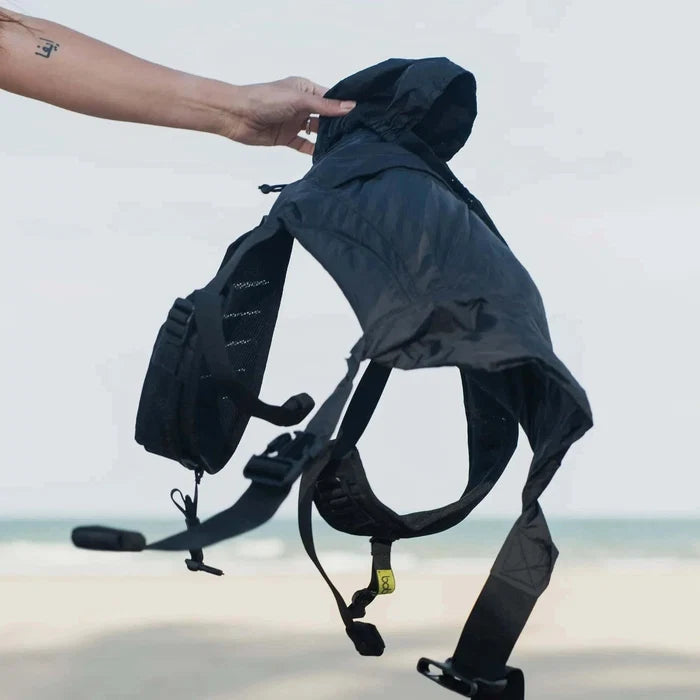 A lightweight, Boba Air Baby Travel Carrier with padded mesh straps, leg openings, adjustable shoulder straps, and an integrated hood. Compact and self-storing, it fits babies 4-24 months (15+ lbs) and children up to 45 lbs, Black