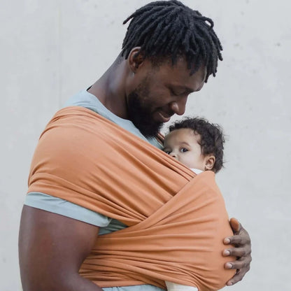 A Boba Classic Baby Wrap, made from a soft 95% French Terry cotton blend and 5% Spandex. Ergonomic, award-winning design fits babies from 7 Ibs to 35 Ibs, best up to 20 Ibs. Machine washable, dryer friendly, and certified hip-healthy. Organic Fox