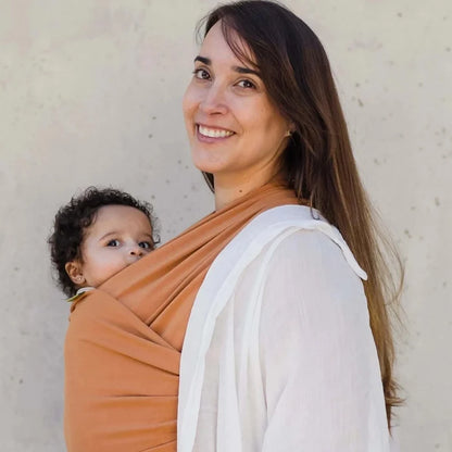 A Boba Classic Baby Wrap, made from a soft 95% French Terry cotton blend and 5% Spandex. Ergonomic, award-winning design fits babies from 7 Ibs to 35 Ibs, best up to 20 Ibs. Machine washable, dryer friendly, and certified hip-healthy. Organic Fox