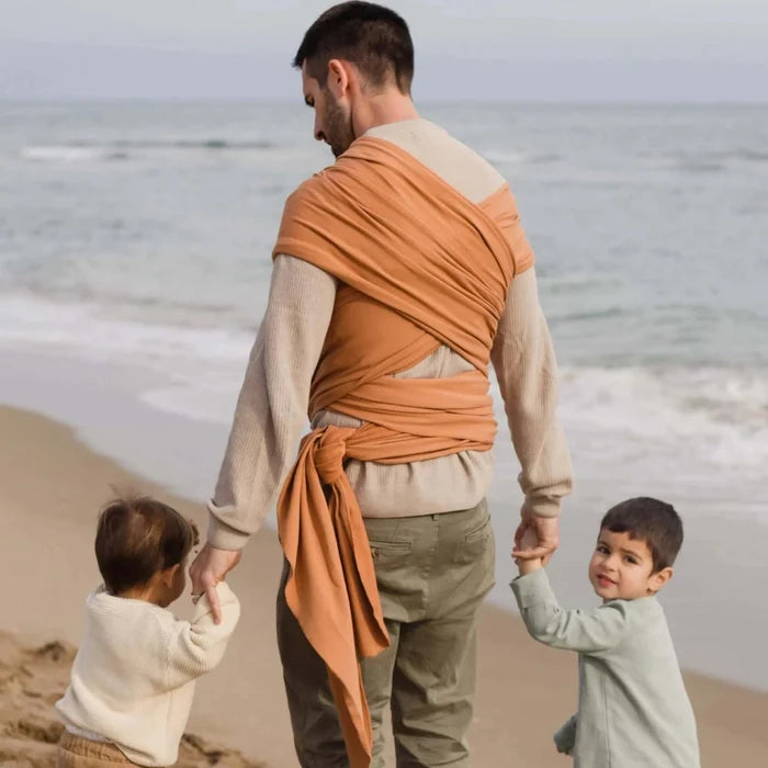 A Boba Classic Baby Wrap, made from a soft 95% French Terry cotton blend and 5% Spandex. Ergonomic, award-winning design fits babies from 7 Ibs to 35 Ibs, best up to 20 Ibs. Machine washable, dryer friendly, and certified hip-healthy. Organic Fox