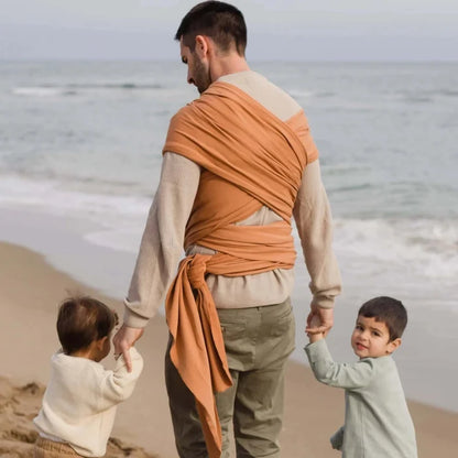 A Boba Classic Baby Wrap, made from a soft 95% French Terry cotton blend and 5% Spandex. Ergonomic, award-winning design fits babies from 7 Ibs to 35 Ibs, best up to 20 Ibs. Machine washable, dryer friendly, and certified hip-healthy. Organic Fox