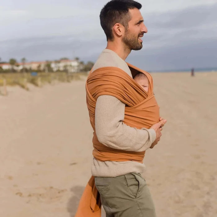 A Boba Classic Baby Wrap, made from a soft 95% French Terry cotton blend and 5% Spandex. Ergonomic, award-winning design fits babies from 7 Ibs to 35 Ibs, best up to 20 Ibs. Machine washable, dryer friendly, and certified hip-healthy. Organic Fox