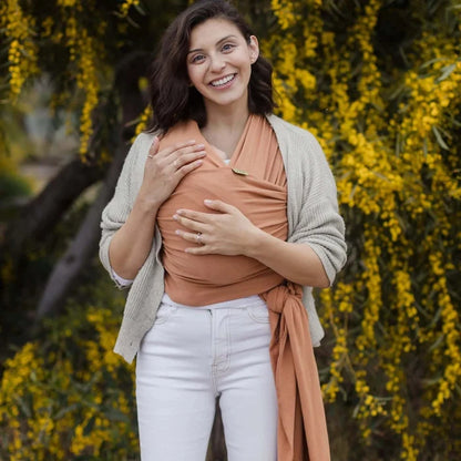 A Boba Classic Baby Wrap, made from a soft 95% French Terry cotton blend and 5% Spandex. Ergonomic, award-winning design fits babies from 7 Ibs to 35 Ibs, best up to 20 Ibs. Machine washable, dryer friendly, and certified hip-healthy. Organic Fox