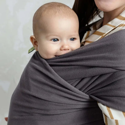 A Boba Classic Baby Wrap, made from a soft 95% French Terry cotton blend and 5% Spandex. Ergonomic, award-winning design fits babies from 7 Ibs to 35 Ibs, best up to 20 Ibs. Machine washable, dryer friendly, and certified hip-healthy. Organic Dark Gray