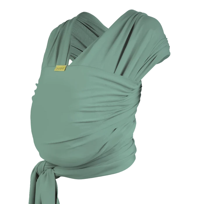 A Boba Classic Baby Wrap, made from a soft 95% French Terry cotton blend and 5% Spandex. Ergonomic, award-winning design fits babies from 7 Ibs to 35 Ibs, best up to 20 Ibs. Machine washable, dryer friendly, and certified hip-healthy. Sage Green