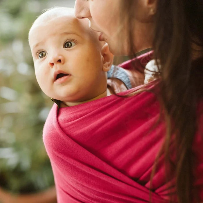 A Boba Classic Baby Wrap, made from a soft 95% French Terry cotton blend and 5% Spandex. Ergonomic, award-winning design fits babies from 7 Ibs to 35 Ibs, best up to 20 Ibs. Machine washable, dryer friendly, and certified hip-healthy. Sangria