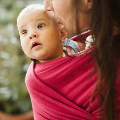 A Boba Classic Baby Wrap, made from a soft 95% French Terry cotton blend and 5% Spandex. Ergonomic, award-winning design fits babies from 7 Ibs to 35 Ibs, best up to 20 Ibs. Machine washable, dryer friendly, and certified hip-healthy. Sangria