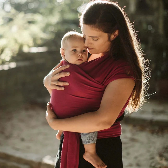 A Boba Classic Baby Wrap, made from a soft 95% French Terry cotton blend and 5% Spandex. Ergonomic, award-winning design fits babies from 7 Ibs to 35 Ibs, best up to 20 Ibs. Machine washable, dryer friendly, and certified hip-healthy. Sangria