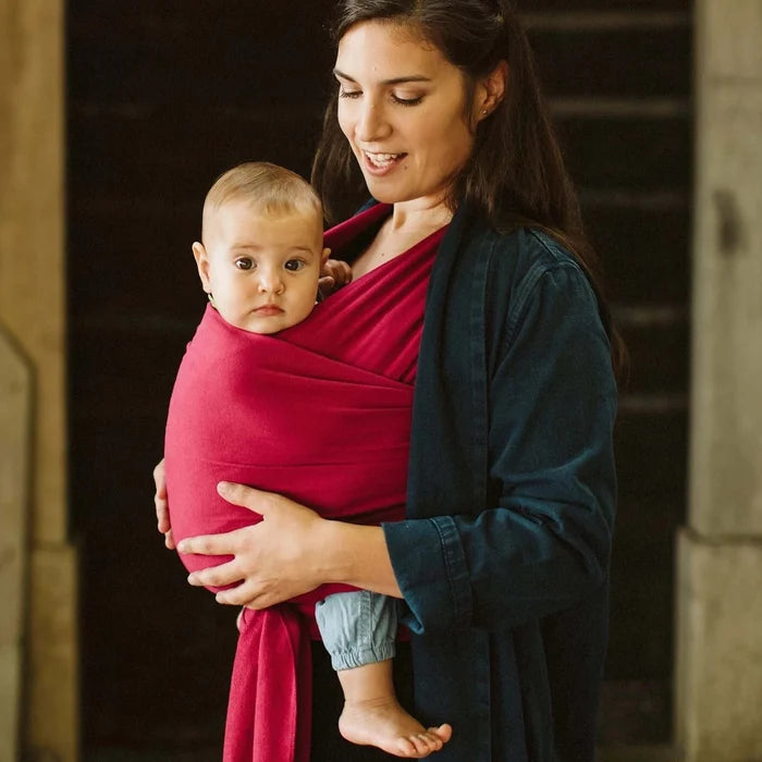 A Boba Classic Baby Wrap, made from a soft 95% French Terry cotton blend and 5% Spandex. Ergonomic, award-winning design fits babies from 7 Ibs to 35 Ibs, best up to 20 Ibs. Machine washable, dryer friendly, and certified hip-healthy. Sangria
