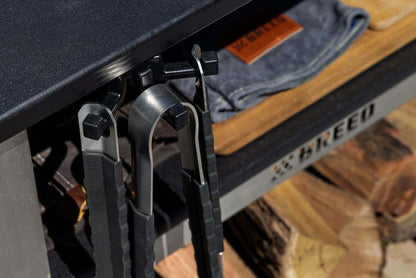 The Breeo Grilling tools hanging from the Breeo Tri-Hook