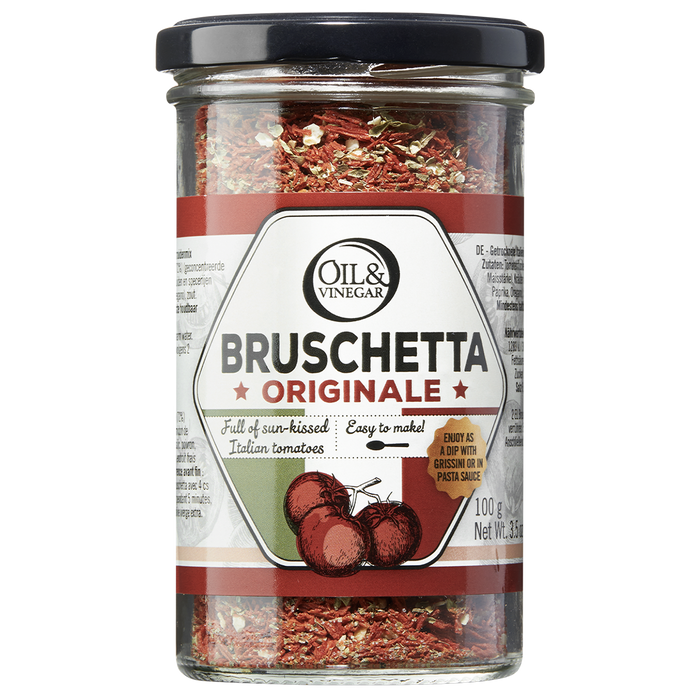 A jar of Bruschetta Originale dried herb blend by Oil & Vinegar, displaying the product label with the name and an image of dried tomatoes and herbs inside.