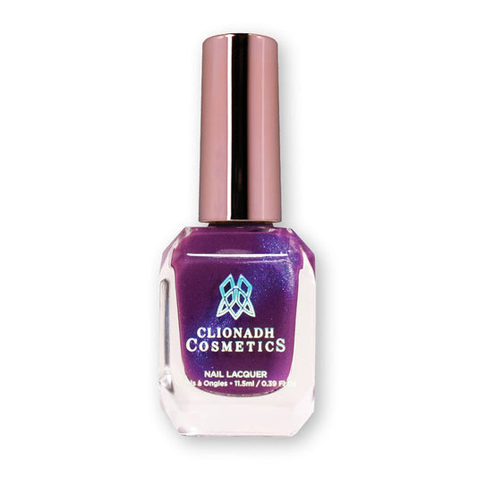 Bottle of nail polish containing Butterfly Pea Flower Nail Lacquer on white background.