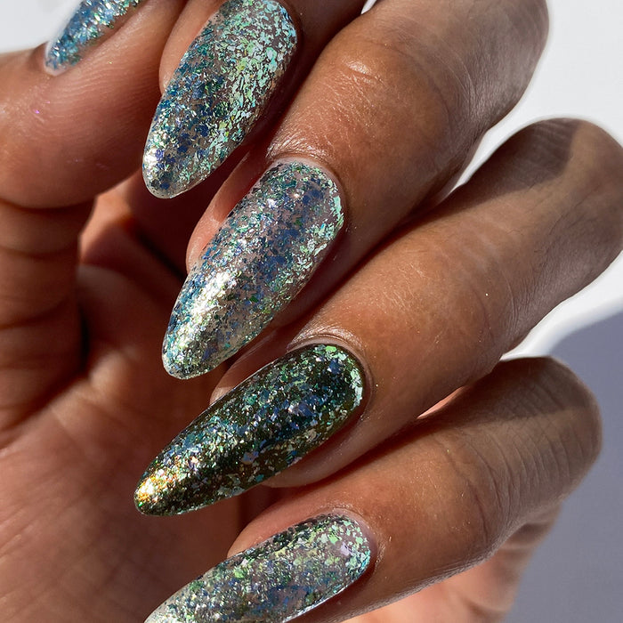 Close-up of nails painted with Catacomb Nail Lacquer on medium skin tone.