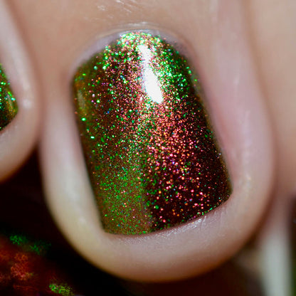 Close-up of one nail painted with Cemetery Nail Lacquer on fair skin tone.