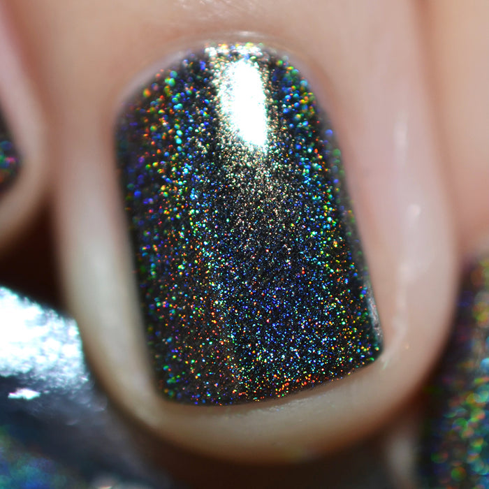 Close-up of one nail painted with Chocholo Chips Nail Lacquer on fair skin tone.