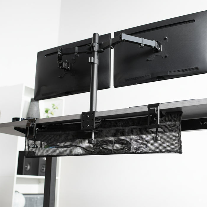 Cable management net under clamp on dual monitor mount to easily guide cords out of the way.