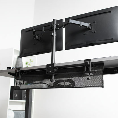 Cable management net under clamp on dual monitor mount to easily guide cords out of the way.