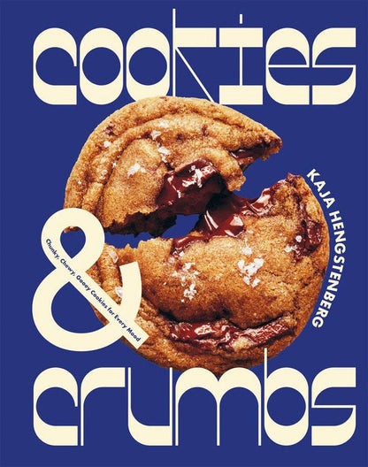Book cover of 'Cookies & Crumbs' with a chocolate chip cookie on a blue background