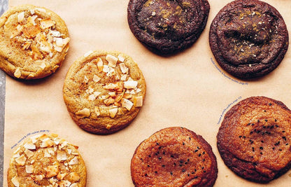 Assorted cookies on a baking sheet