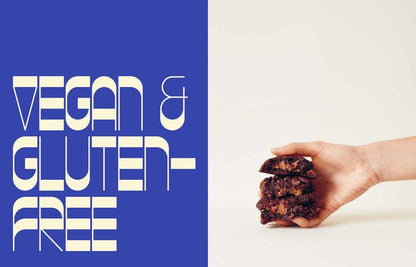 Hand holding a vegan and gluten-free cookie with text on a blue and white background