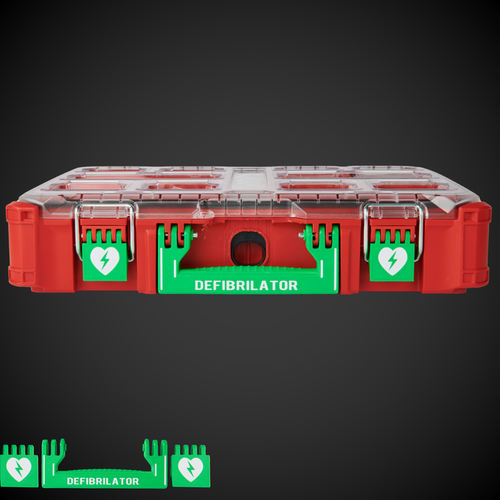 A red and clear Defibrillator kit container with green handles and white text labels, designed to fit into a Milwaukee Packout stack.