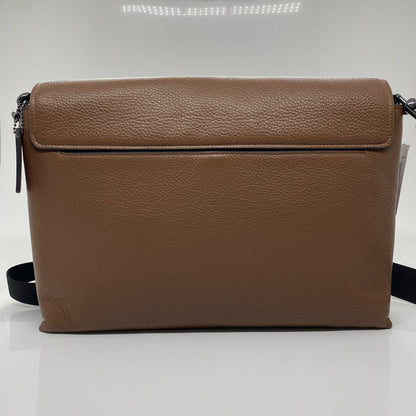 Coach designer travel