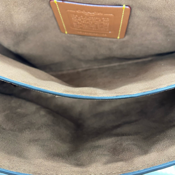Coach designer travel