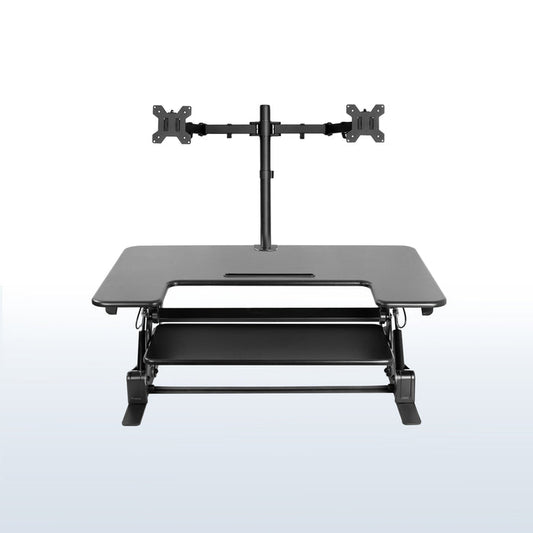 Height adjustable desk riser with articulating dual monitor mount.