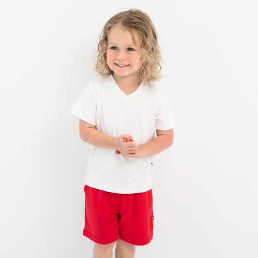 Toddler modeling Drawstring Short in Cardinal and Snow V-neck