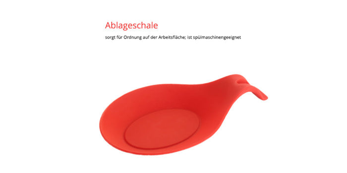 Die Unold ESGE-Zauberstab Ablageschale ist eine rote Silikon-Löffelablage mit Griff auf weißem Grund. Sie eignet sich ideal zum Aufräumen von Arbeitsflächen und ist spülmaschinenfest.